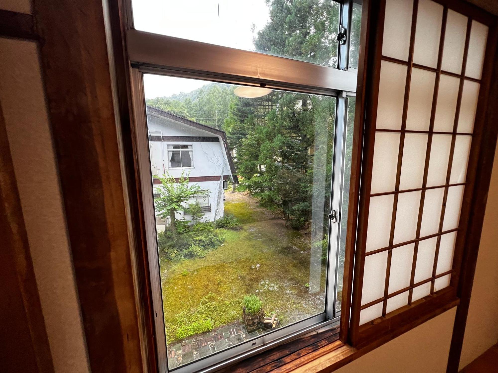 Sneaky Peaks Hotel Hakuba Buitenkant foto
