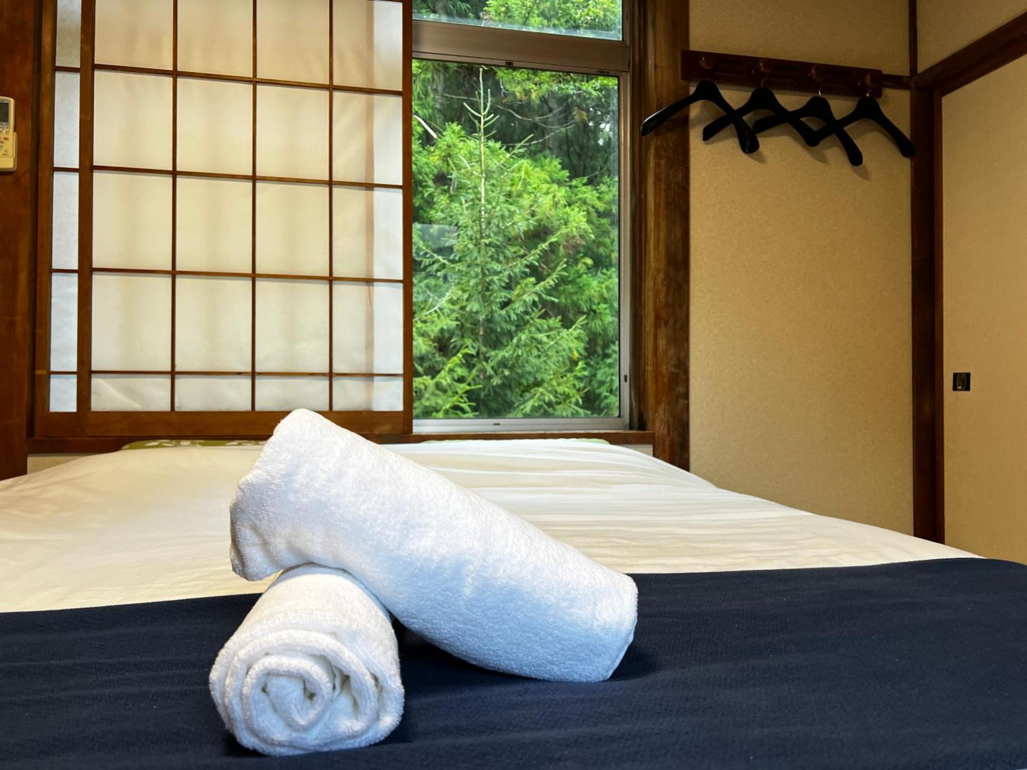 Sneaky Peaks Hotel Hakuba Buitenkant foto